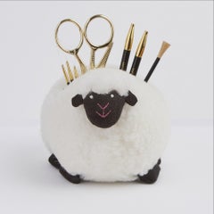 Shepra - k&auml;sity&ouml;tarvikkeiden pidike