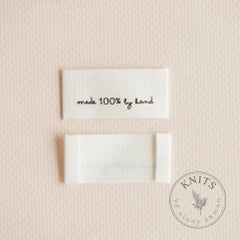 Knits Made 100 % by hand - etiketti - kangas
