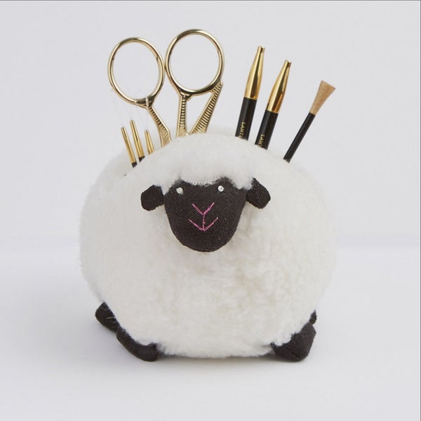 Shepra - k&auml;sity&ouml;tarvikkeiden pidike